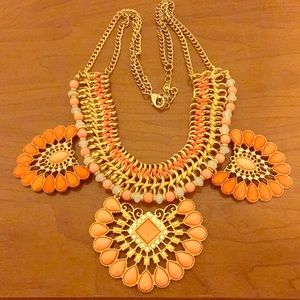 Orange gem stone necklace.